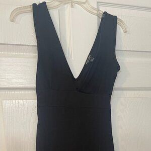 Black sleeveless V front and back dress with back split by Nastygirl - size 0